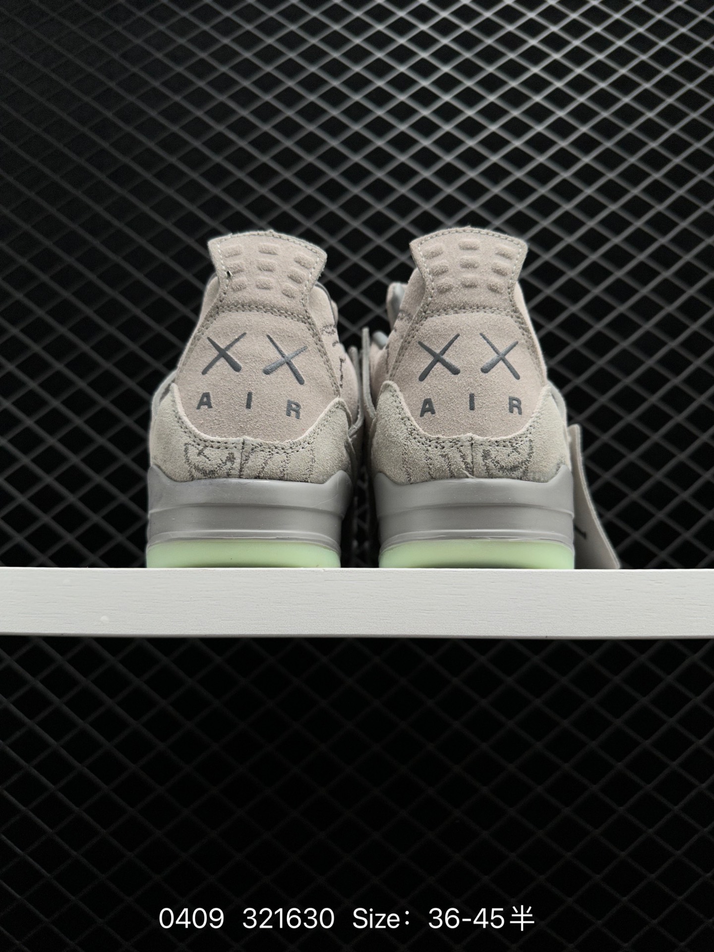 KAWS x Air Jordan 4 “Cool Grey”